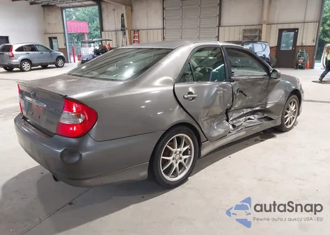 2003 Toyota Camry Le from USA, damaged, VIN 4T1BE32K33U716670